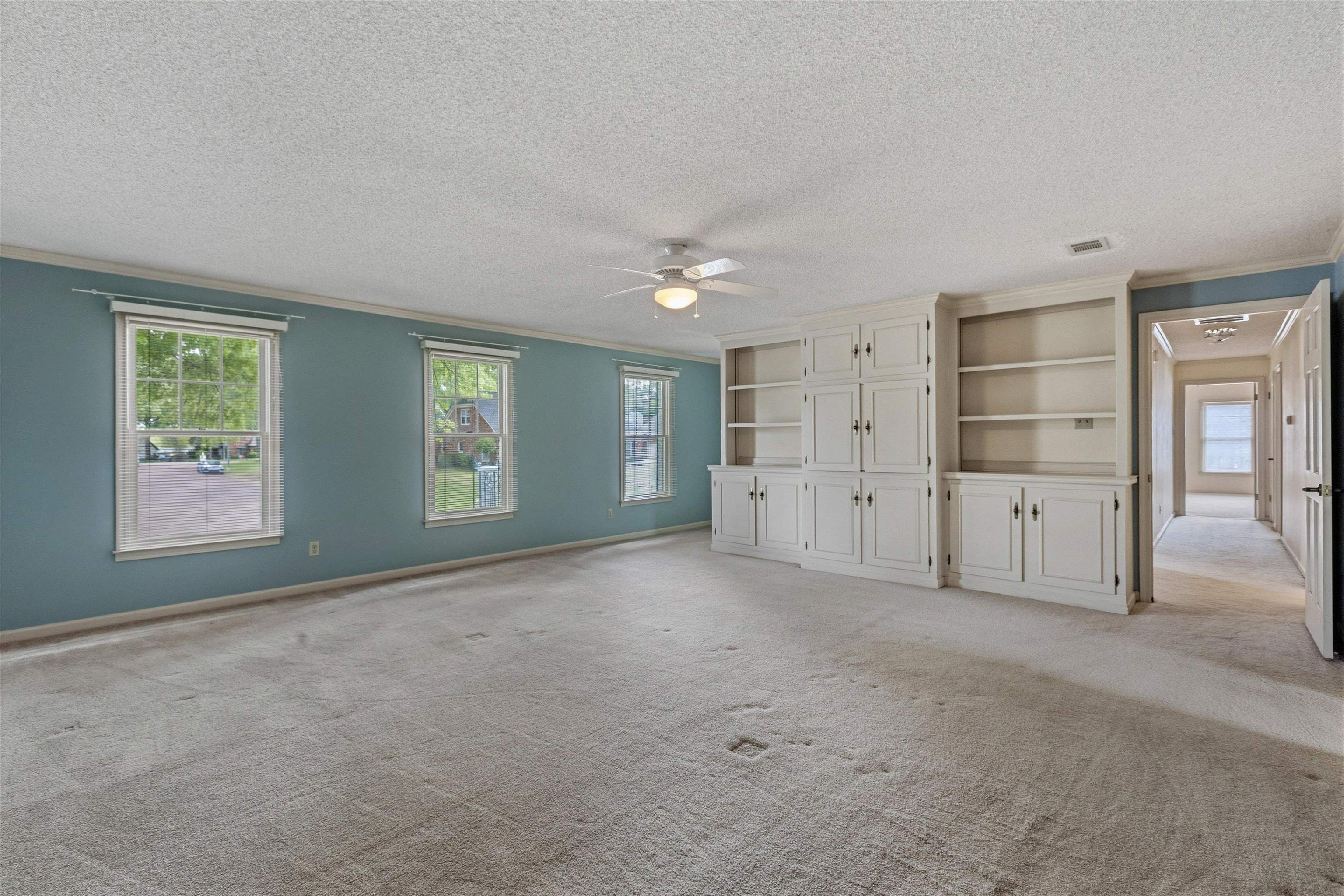 2783 West Levee Oaks Collierville, TN 38017 - Photo 26 of 40 an empty room with windows and closet