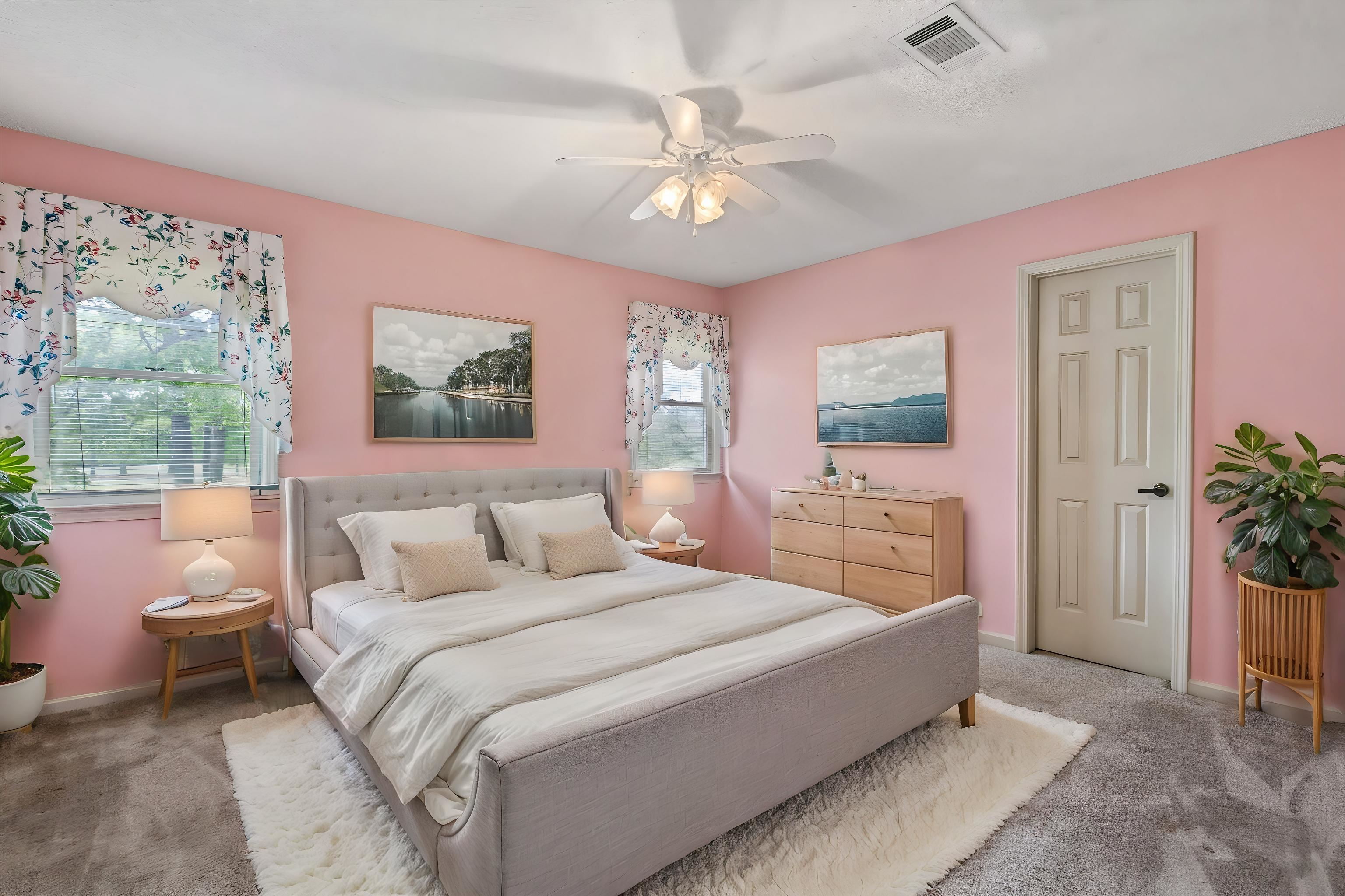 2783 West Levee Oaks Collierville, TN 38017 - Photo 30 of 40 a bedroom with a large bed and a chandelier