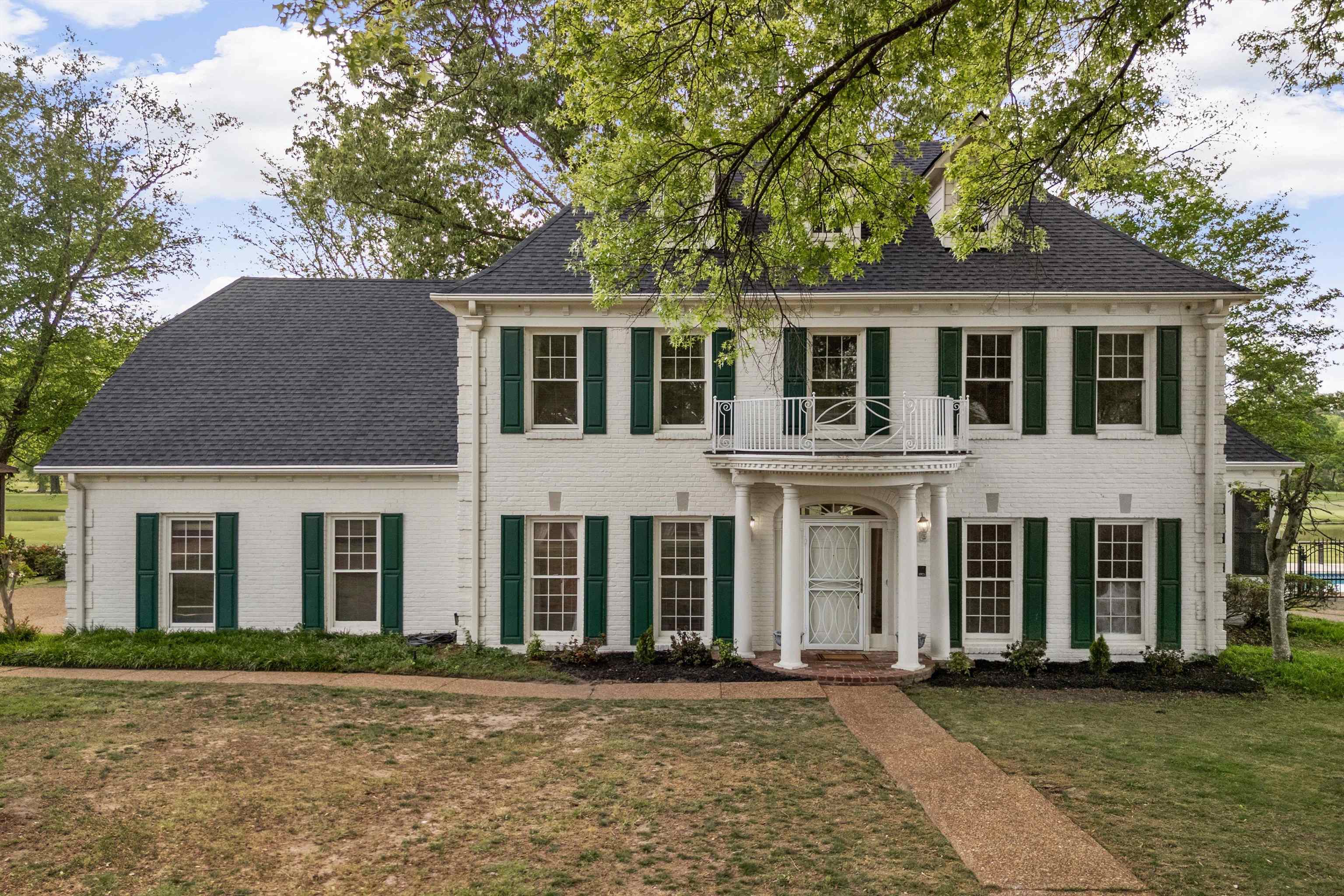 2783 West Levee Oaks Collierville, TN 38017 - Photo 3 of 40 front view of a brick house with a yard