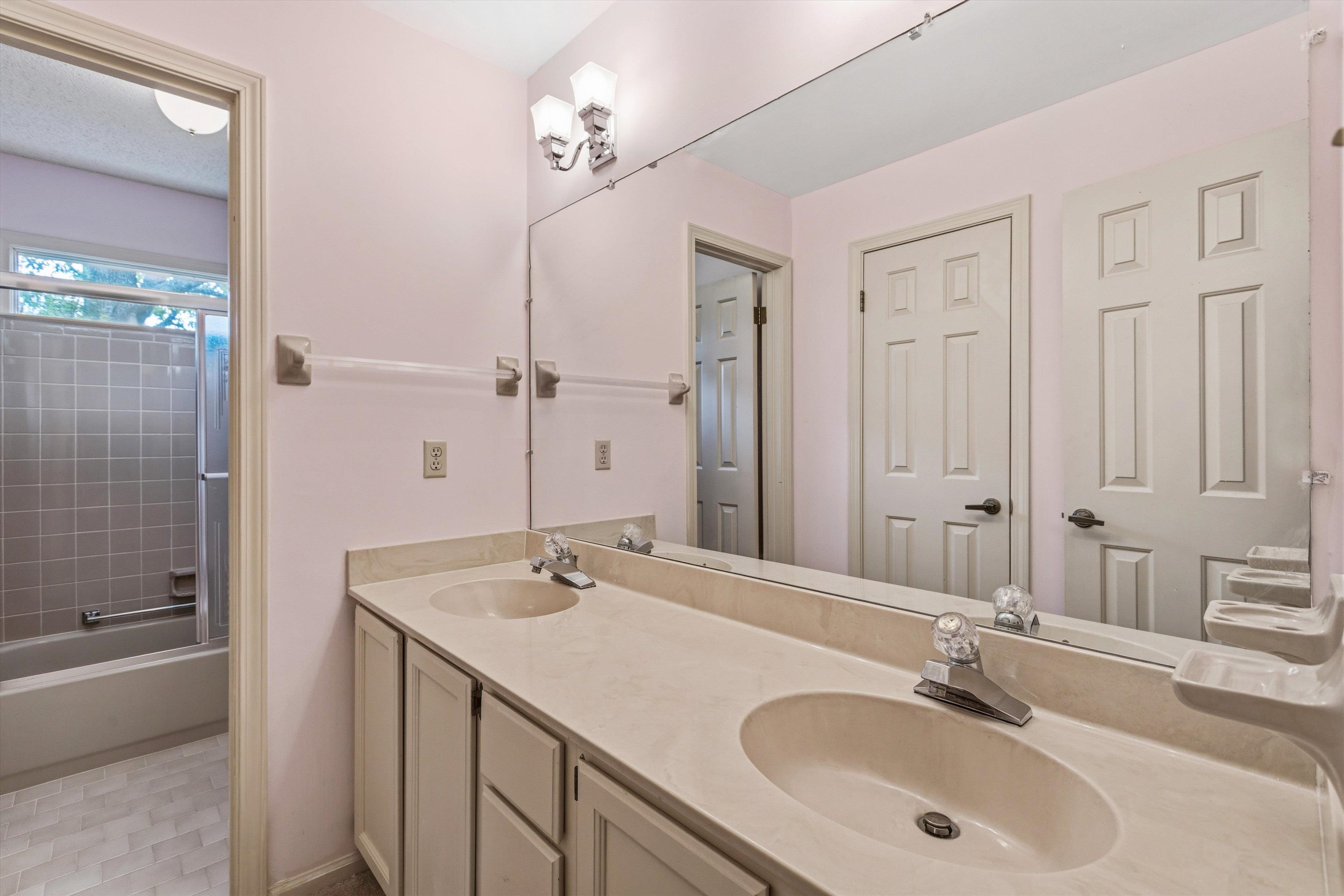 2783 West Levee Oaks Collierville, TN 38017 - Photo 31 of 40 a bathroom with a sink and a mirror