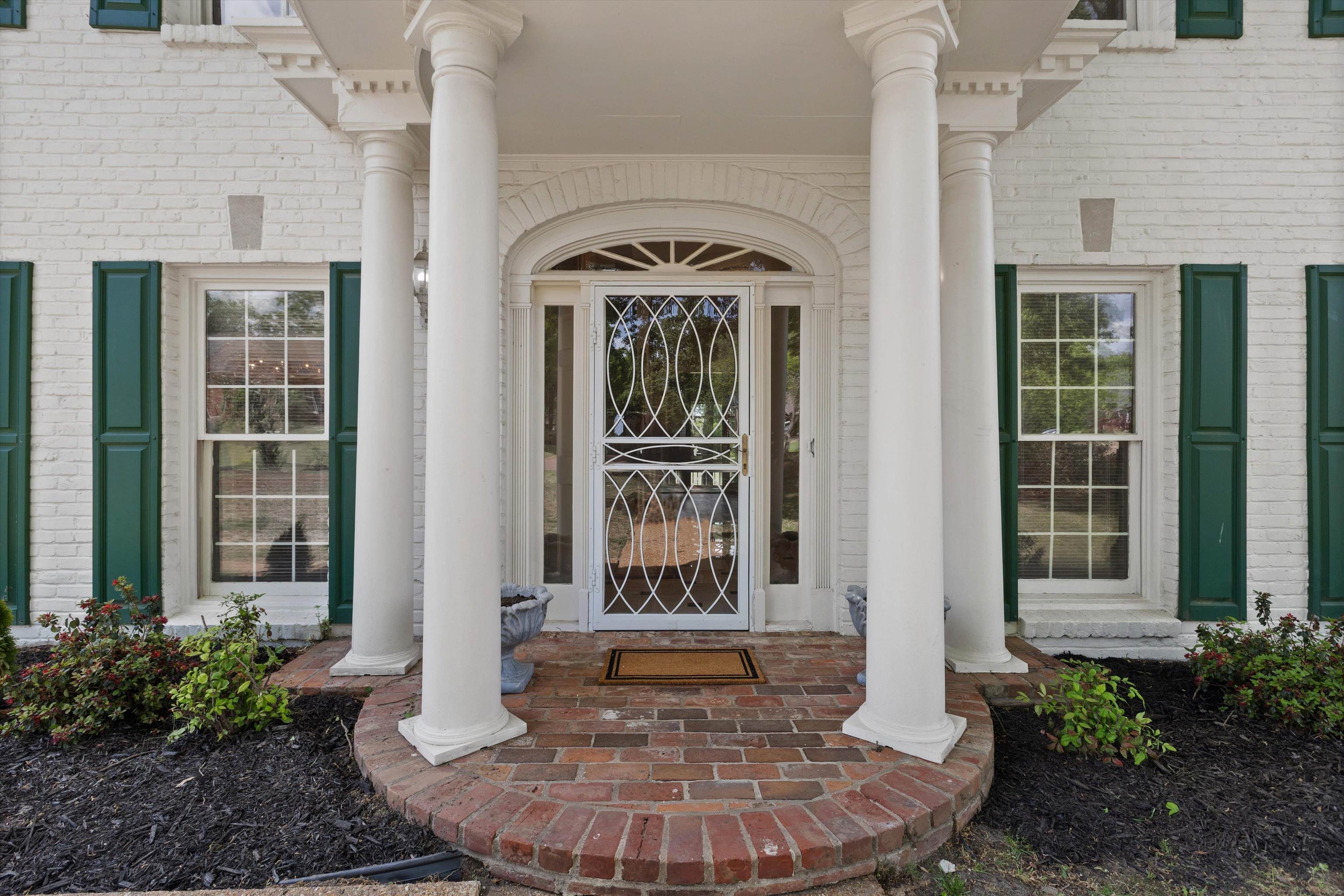 2783 West Levee Oaks Collierville, TN 38017 - Photo 5 of 40 a view of a house with a porch
