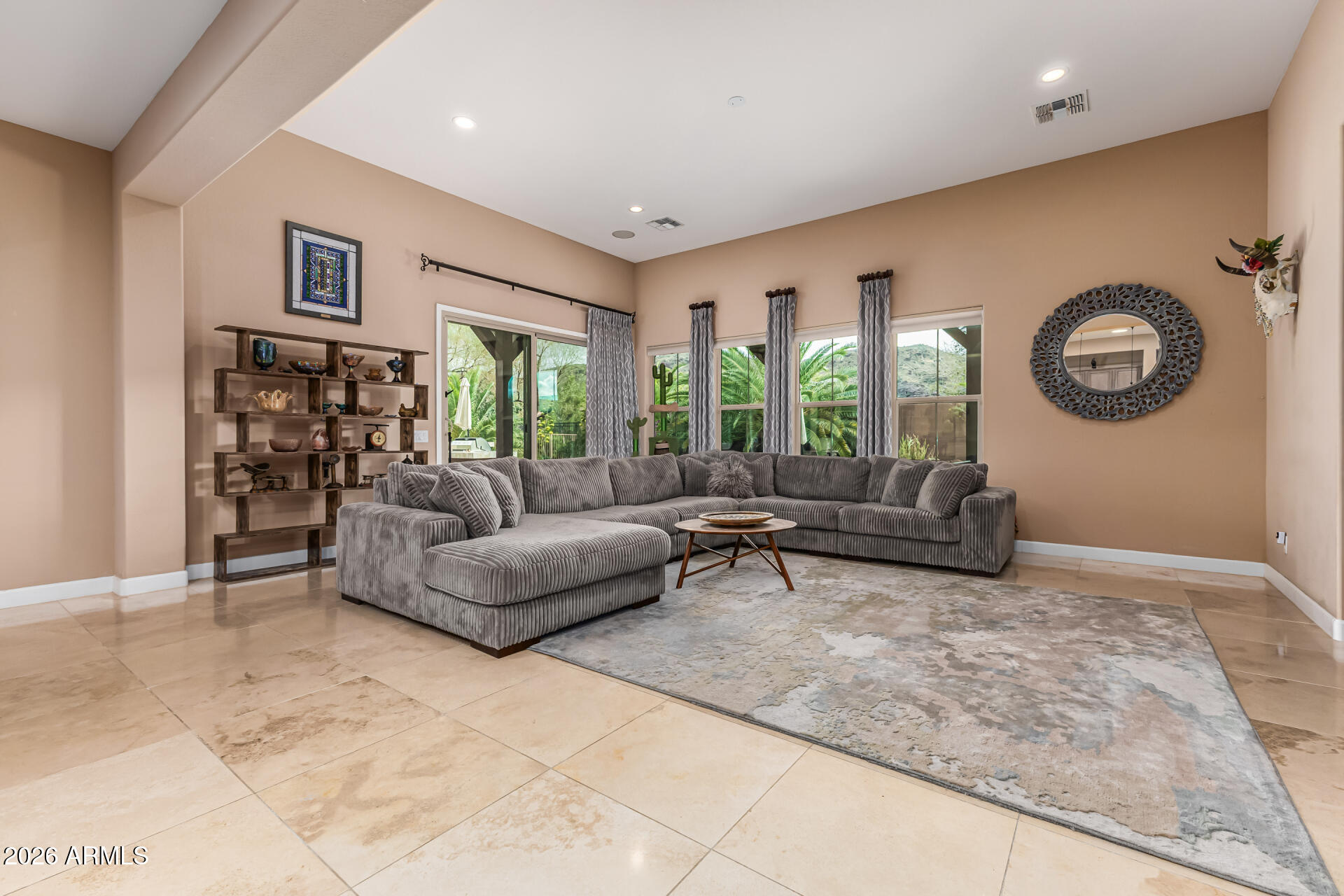 3139 East Harwell Road Phoenix, AZ 85042 - Photo 9 of 45 a living room with furniture and a large window
