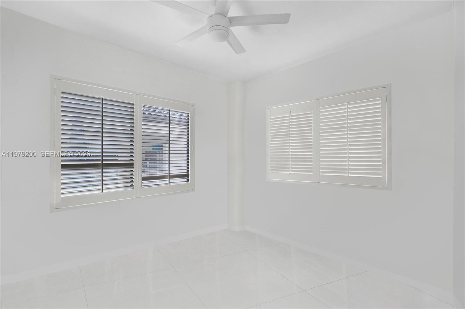 13676 Southwest 33rd Terrace Miami, FL 33175 - Photo 25 of 90 a view of an empty room with a window