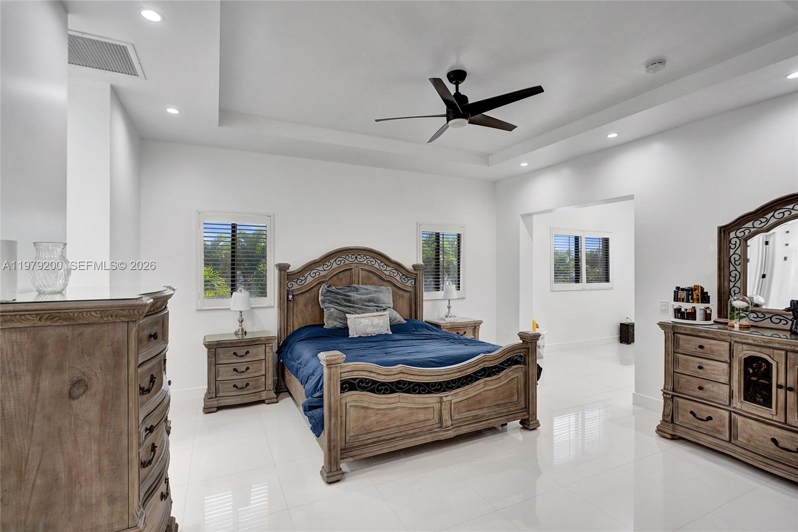 13676 Southwest 33rd Terrace Miami, FL 33175 - Photo 37 of 90 a living room with furniture and a flat screen tv