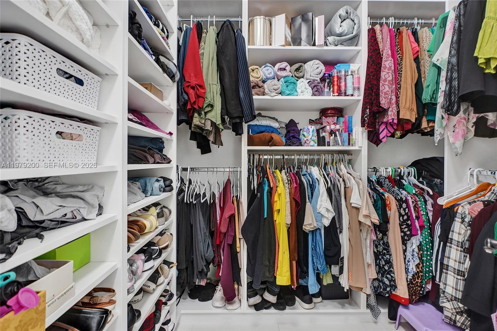13676 Southwest 33rd Terrace Miami, FL 33175 - Photo 45 of 90 a view of walk in closet with clothes