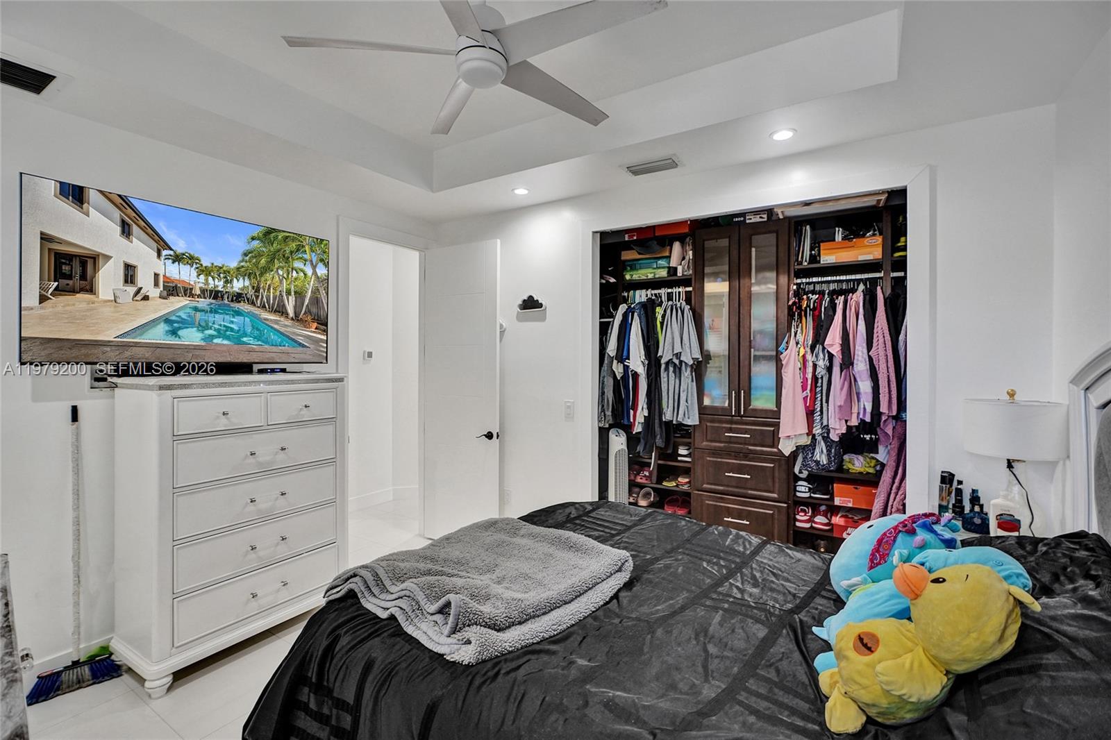 13676 Southwest 33rd Terrace Miami, FL 33175 - Photo 50 of 90 a bedroom with a bed and a closet