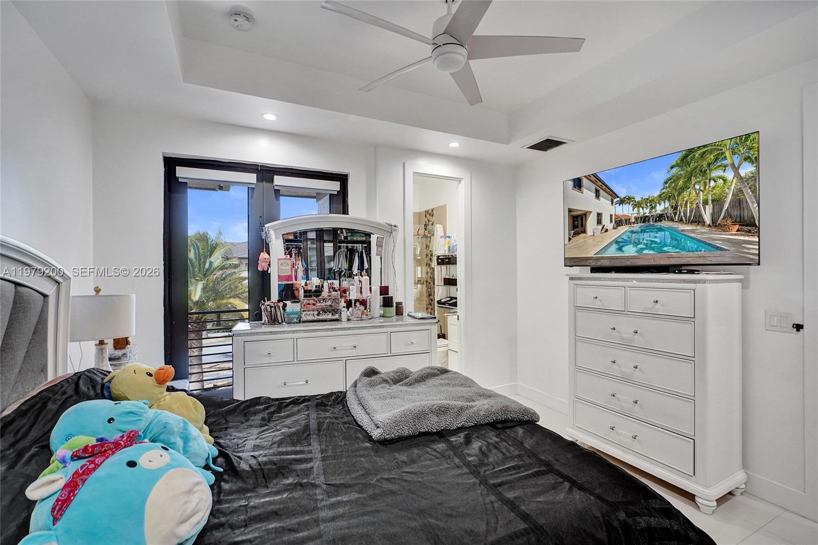 13676 Southwest 33rd Terrace Miami, FL 33175 - Photo 51 of 90 a very nice looking room with a baby crib