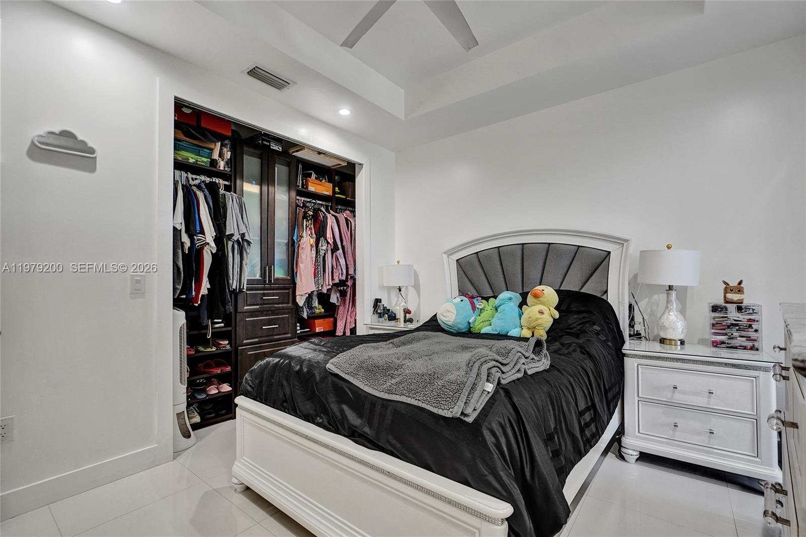 13676 Southwest 33rd Terrace Miami, FL 33175 - Photo 52 of 90 a bedroom with a bed and a closet