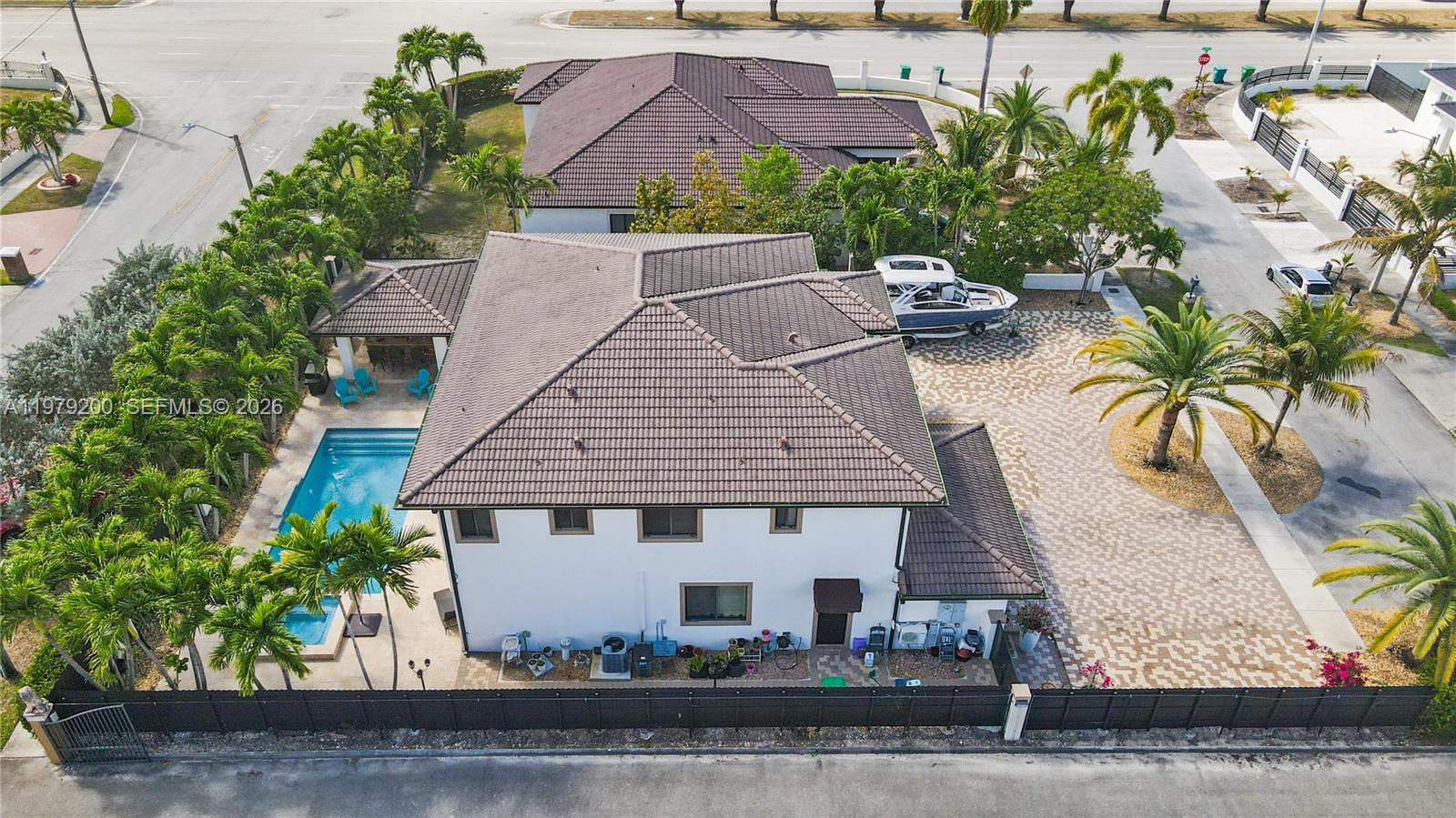 13676 Southwest 33rd Terrace Miami, FL 33175 - Photo 84 of 90 an aerial view of a house with garden space and sitting area