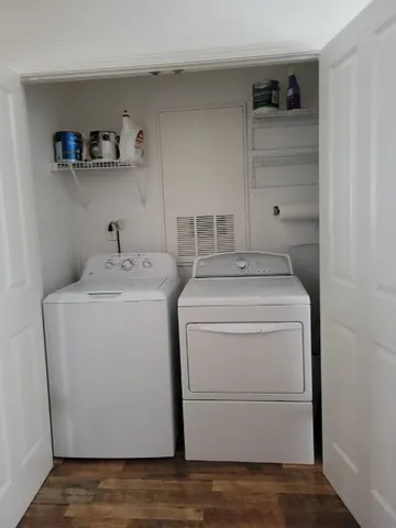 a utility room with dryer and washer
