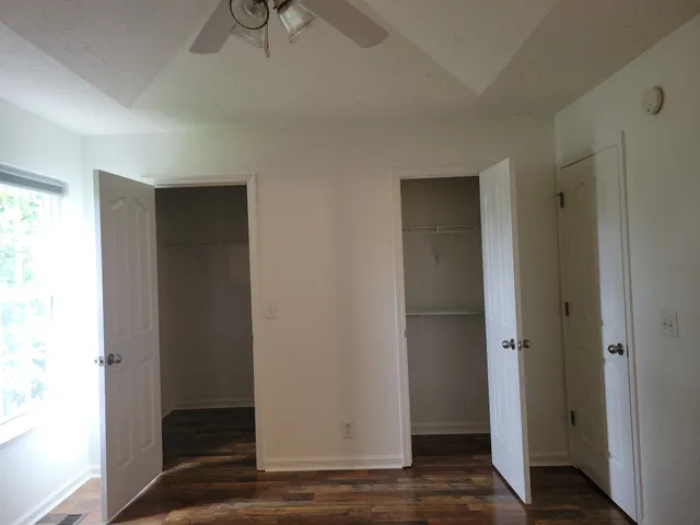 a view of front door with wooden floor