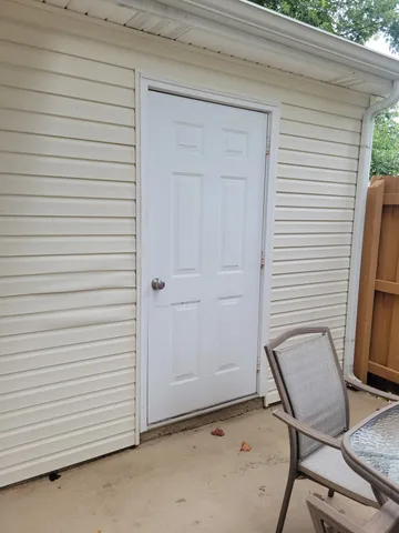 a view of a room with a door