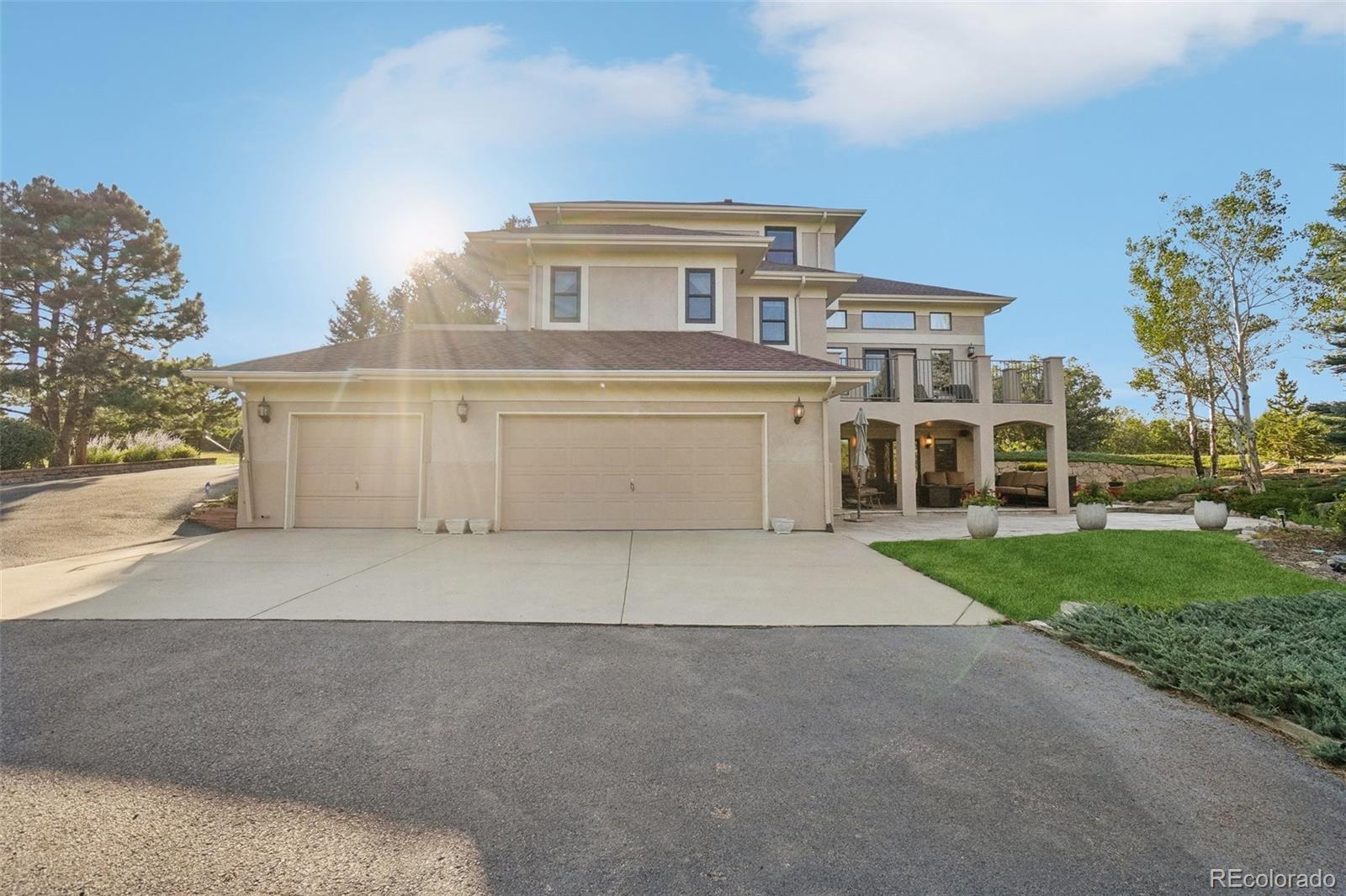 1475 Elk View Road Larkspur, CO 80118 - Photo 41 of 45 a house view with a outdoor space