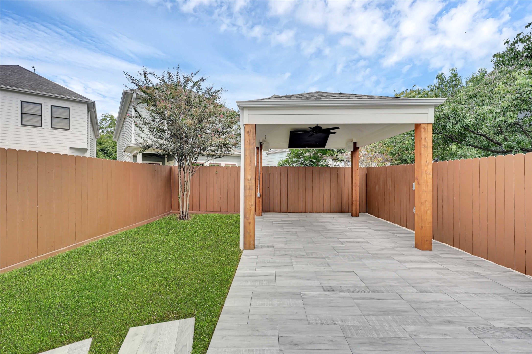 4418 Edsee Street Houston, TX 77009 - Photo 26 of 28 The yard is equipped with a gorgeous pergola, that is pre-wired with several outlets. Perfect for entertaining guests, decorating, and more!