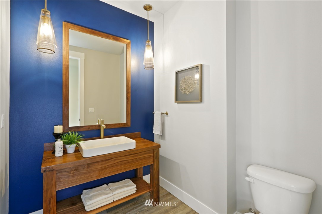 1430 236th Street Southeast Bothell, WA 98021 - Photo 14 of 38 a bathroom with a sink and a mirror