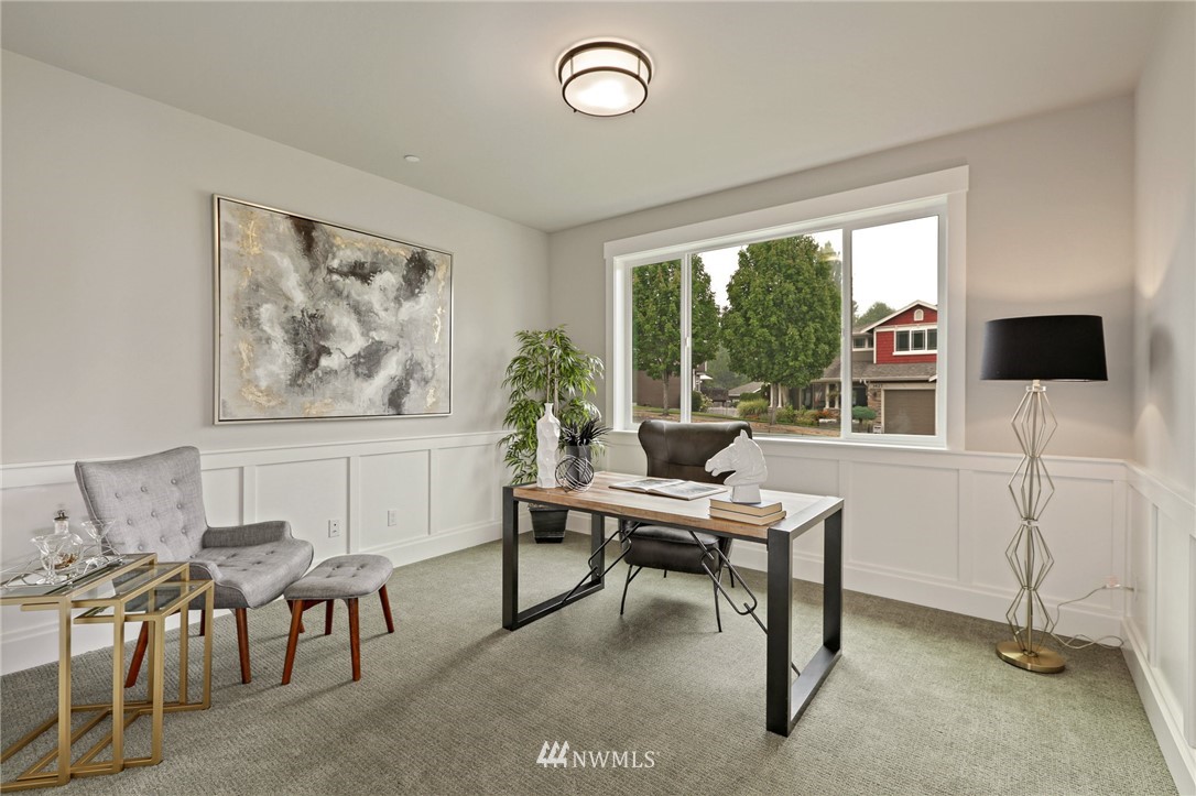 1430 236th Street Southeast Bothell, WA 98021 - Photo 15 of 38 a view of a workspace with furniture and a window