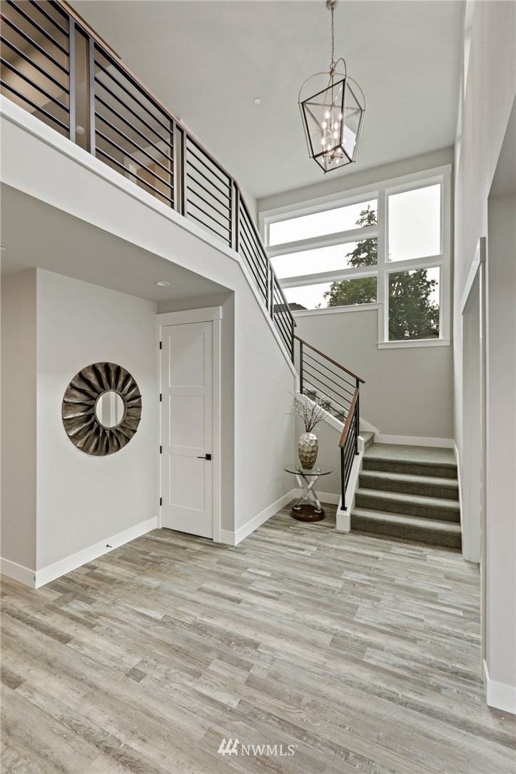 1430 236th Street Southeast Bothell, WA 98021 - Photo 17 of 38 a view of an entryway with wooden floor