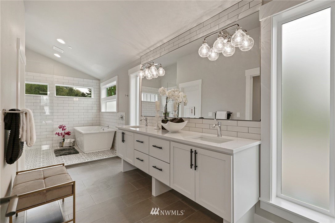 1430 236th Street Southeast Bothell, WA 98021 - Photo 20 of 38 a bathroom with double vanity and a mirror