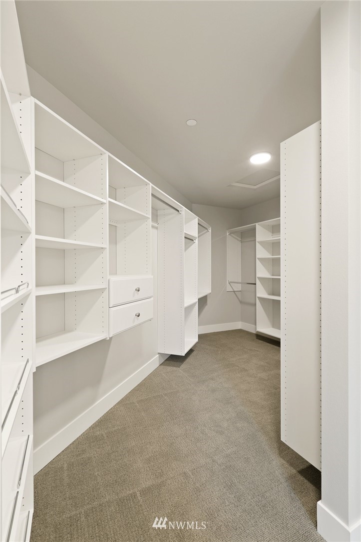 1430 236th Street Southeast Bothell, WA 98021 - Photo 22 of 38 a view of an empty room with a closet
