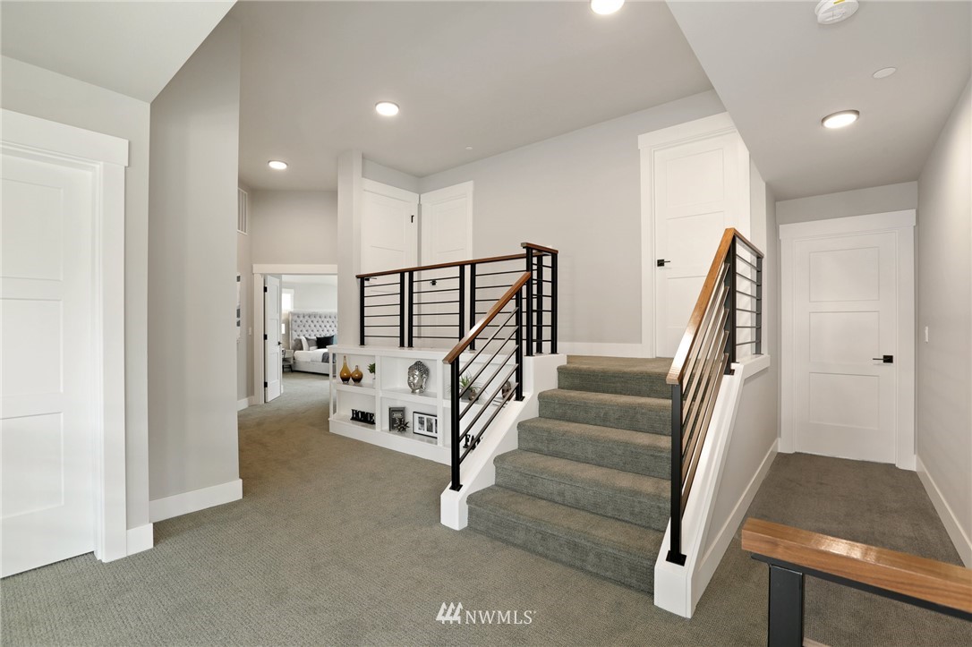 1430 236th Street Southeast Bothell, WA 98021 - Photo 24 of 38 a view of entryway with livingroom and stairs