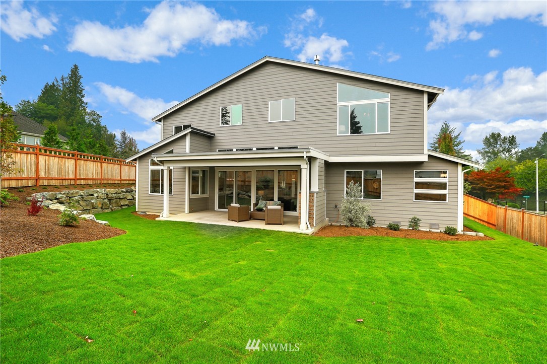 1430 236th Street Southeast Bothell, WA 98021 - Photo 37 of 38 a front view of house with yard and green space