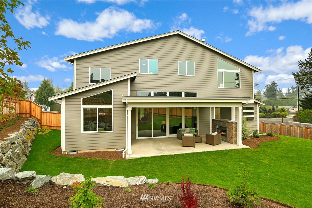 1430 236th Street Southeast Bothell, WA 98021 - Photo 38 of 38 a view of a house with a yard