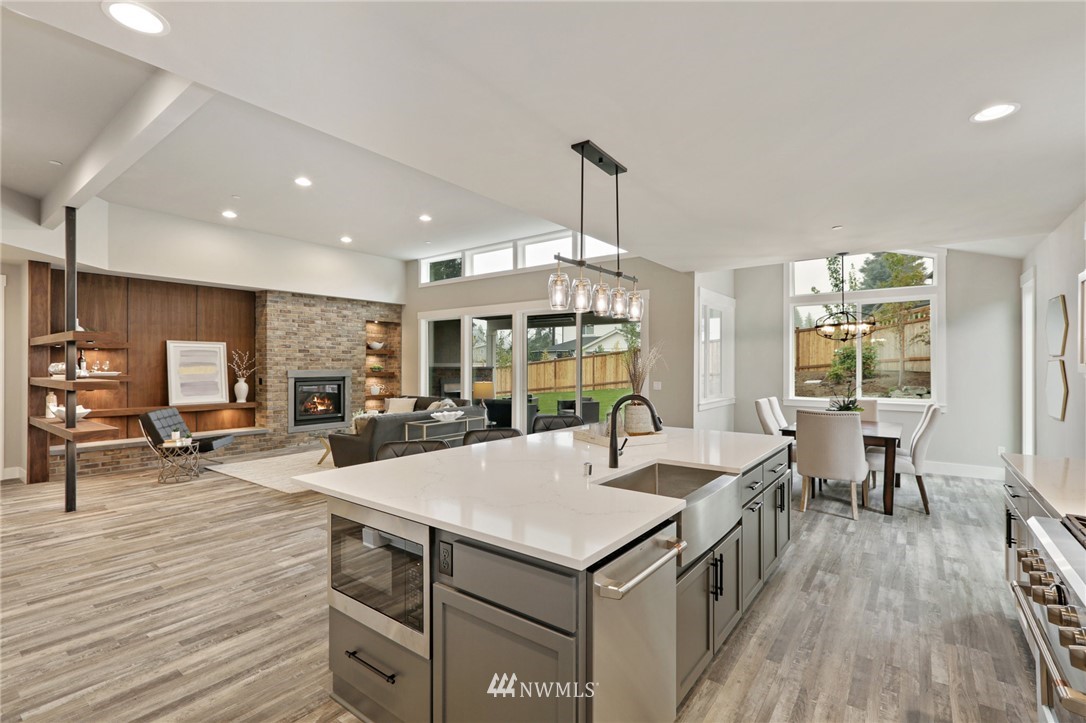 1430 236th Street Southeast Bothell, WA 98021 - Photo 10 of 38 a large kitchen with a table and chairs
