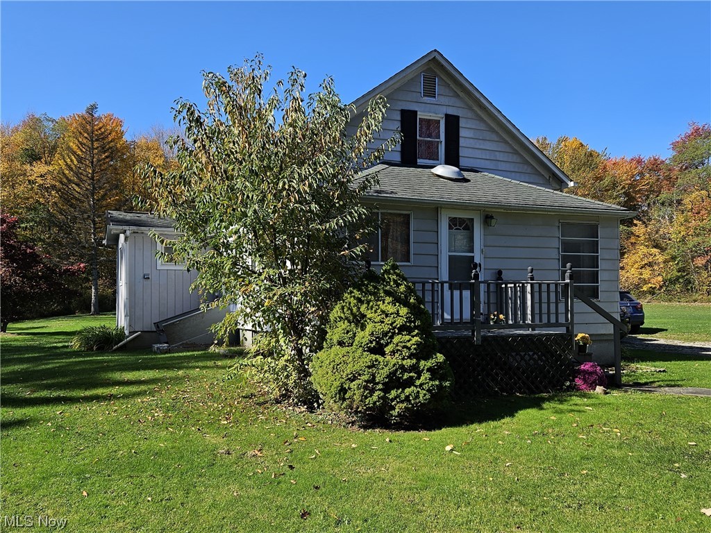 6700 Ledge Road Thompson, OH 44086 - Photo 1 of 15 View of front of property with a front yard