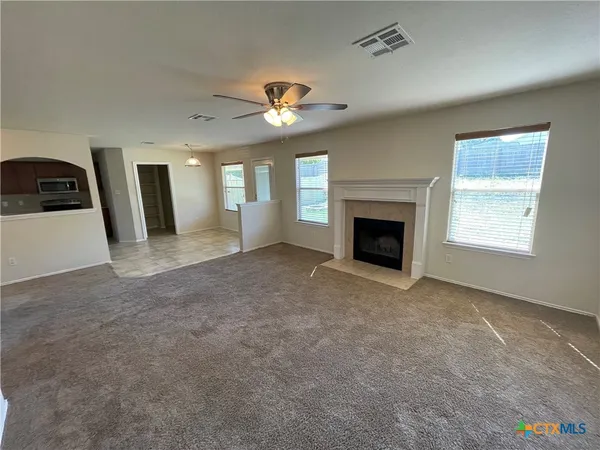 a view of a livingroom with a fireplace