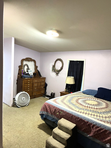 547 East 2000th Street North Vernal, UT 84078 - Photo 15 of 50 Carpeted room with light purple walls