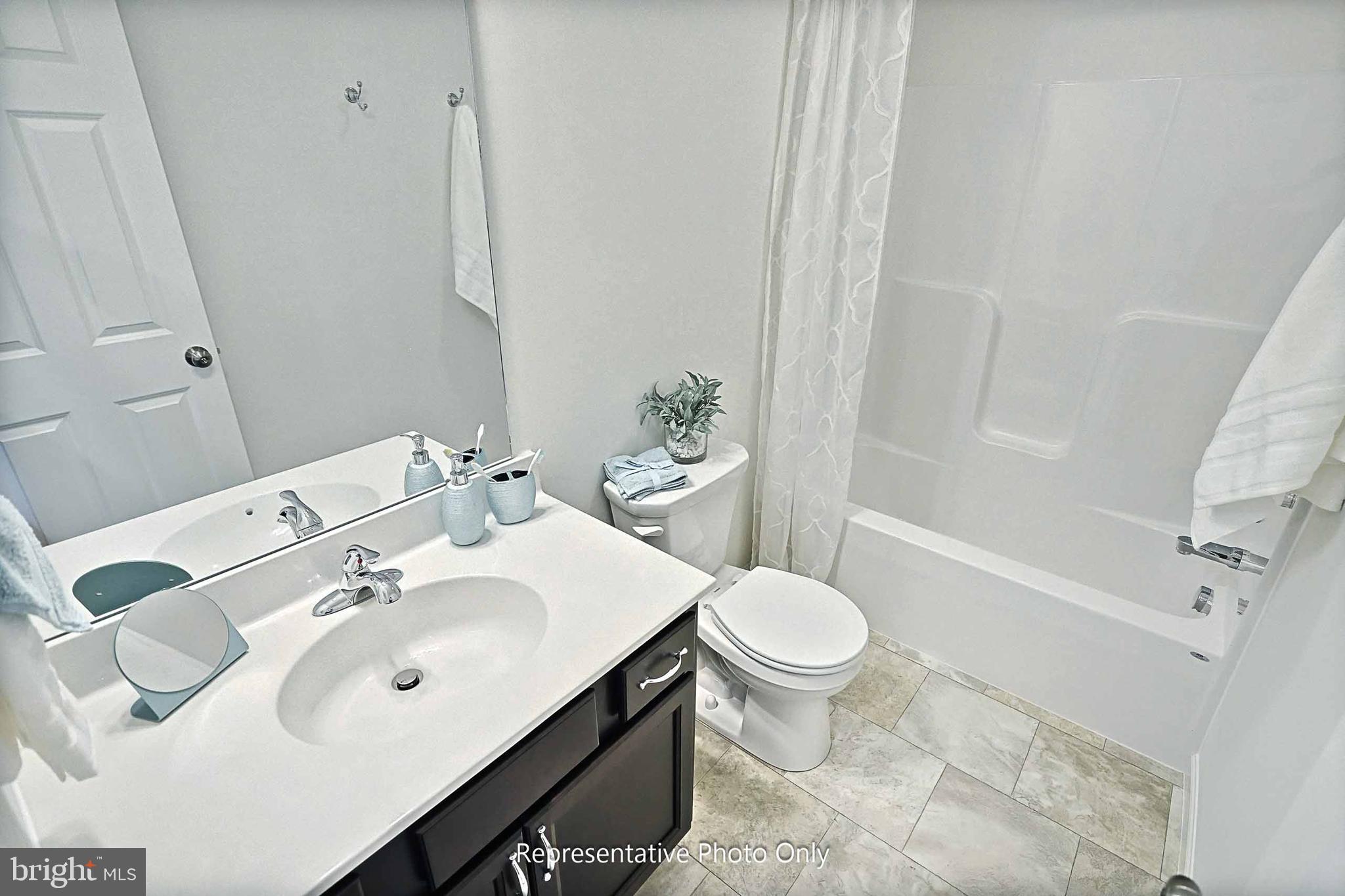 29 Glenn View Carlisle, PA 17013 - Photo 24 of 25 a bathroom with a sink toilet and shower