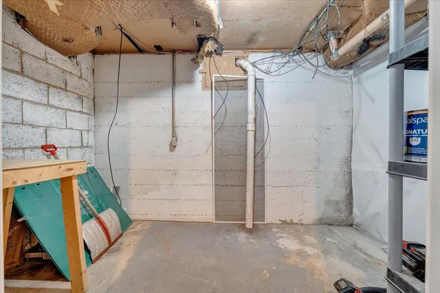 a view of a city with lush green forest