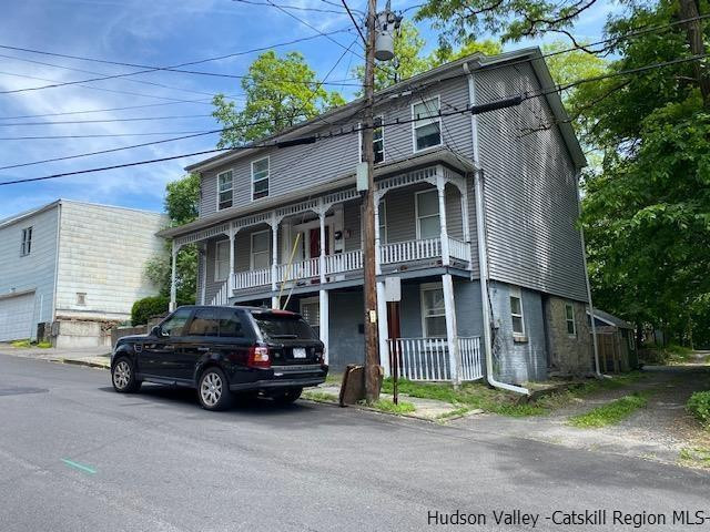 a car parked in front of a house