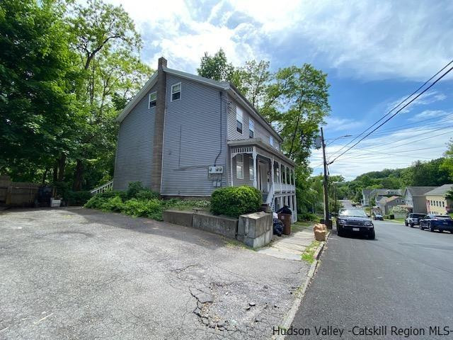100 Hunter Street Kingston, NY 12401 - Photo 2 of 8 a view of car parked in front of house