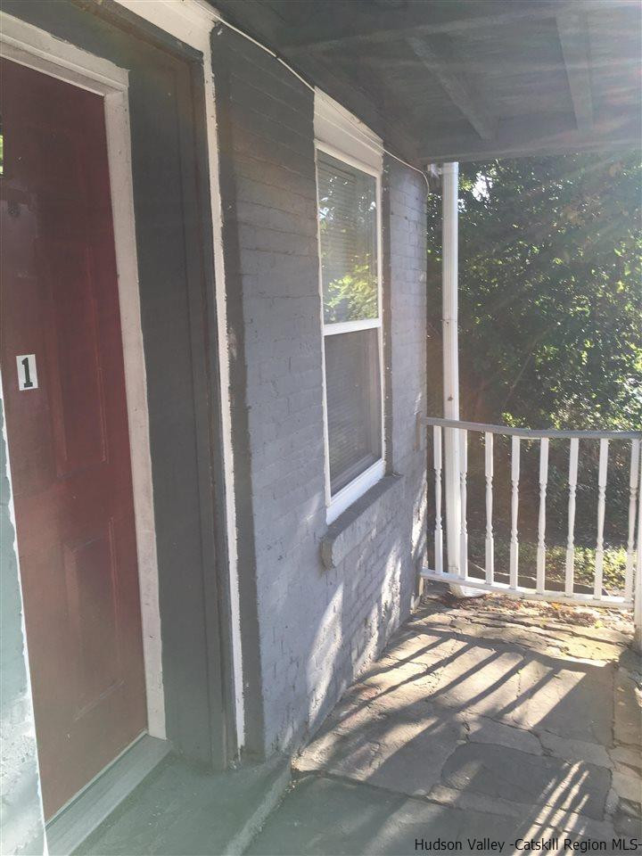 100 Hunter Street Kingston, NY 12401 - Photo 3 of 8 a view of porch with yard