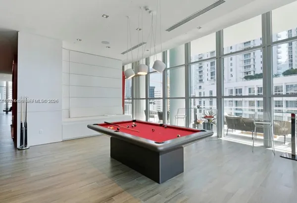 a living room with furniture and a rug