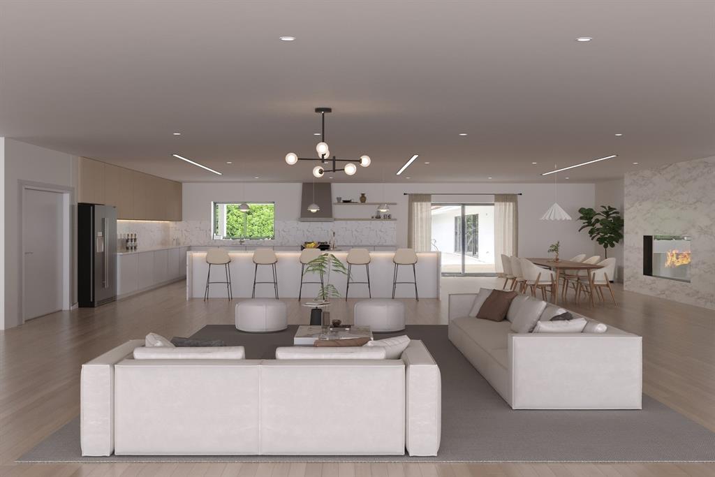 2800 Palmer Drive Hollywood, FL 33021 - Photo 4 of 13 a living room with furniture and a chandelier