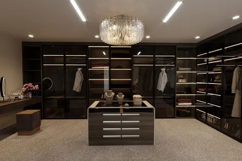 a kitchen with a refrigerator and a stove