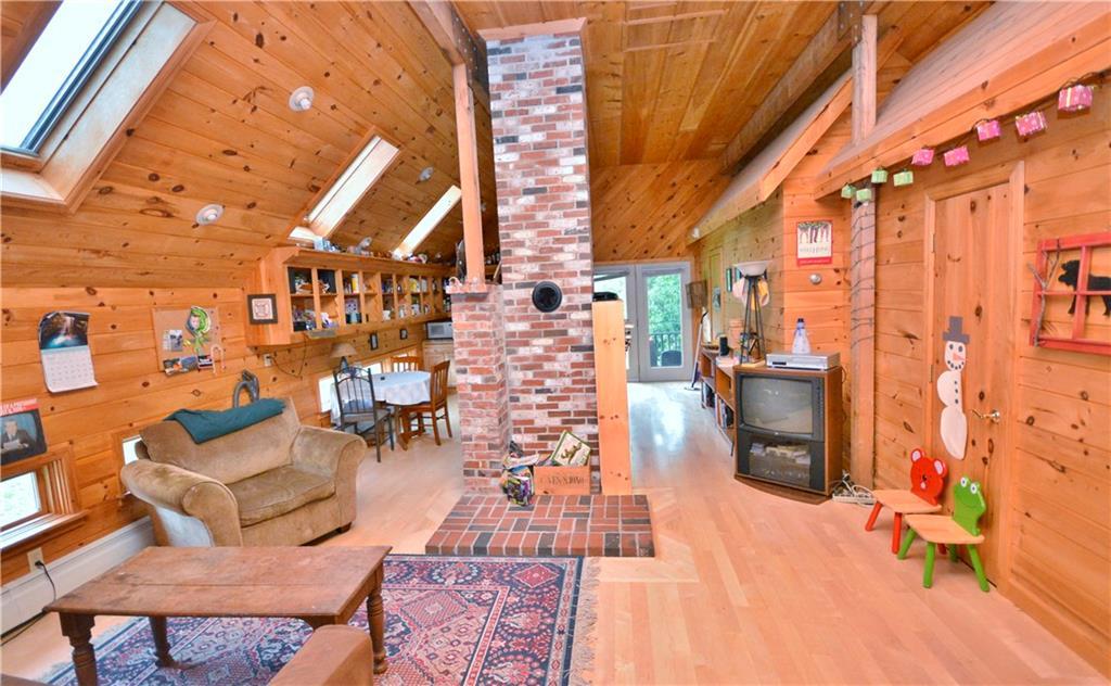 580 Airline Road Ellsworth, ME 04605 - Photo 5 of 14 The open floor concept with vaulted...