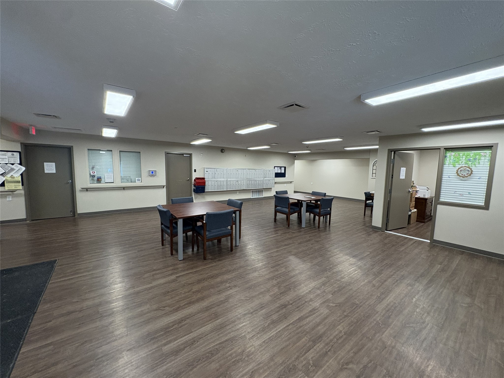 1700 Park Street Beatrice, NE 68310 - Photo 13 of 25 a view of a dining room with furniture and wooden floor