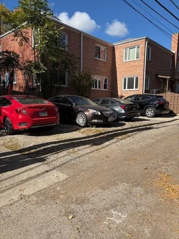 a cars parked in front of a house