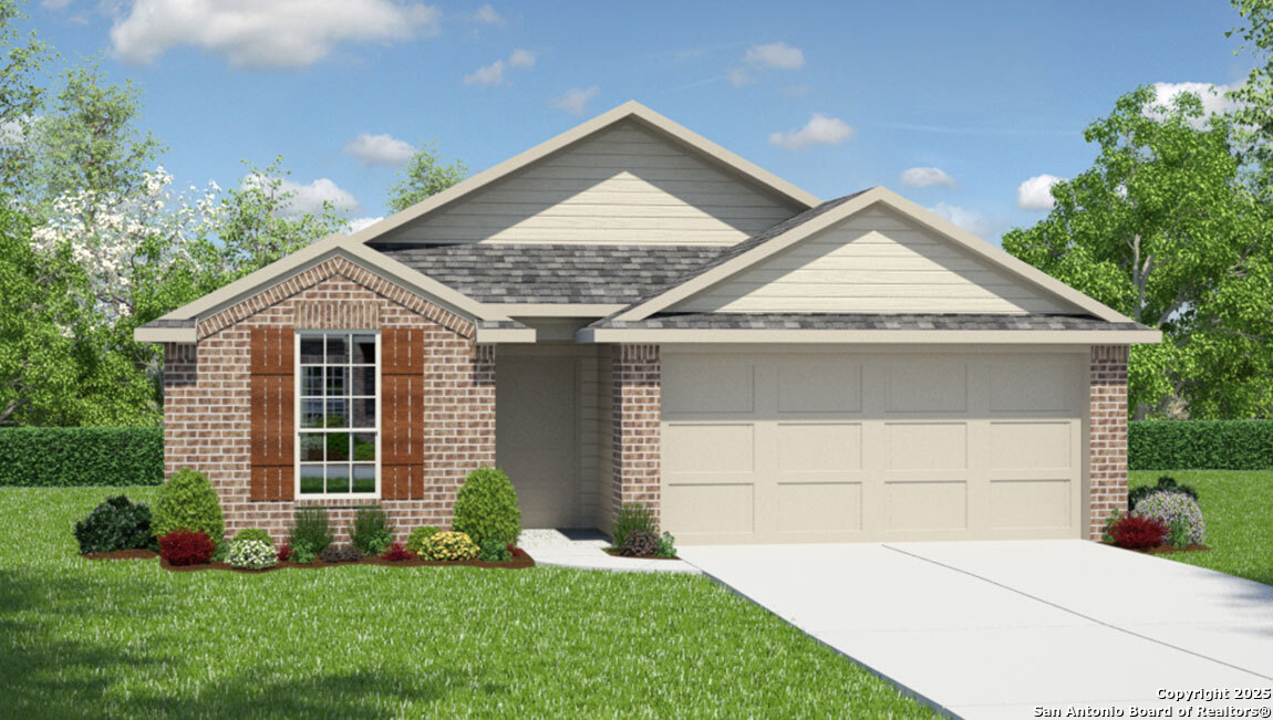 623 Fluted Shoals Cibolo, TX 78108 - Photo 1 of 1 a front view of a house with a yard and garage