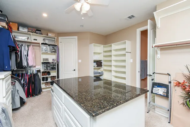 a view of a living room and entry way