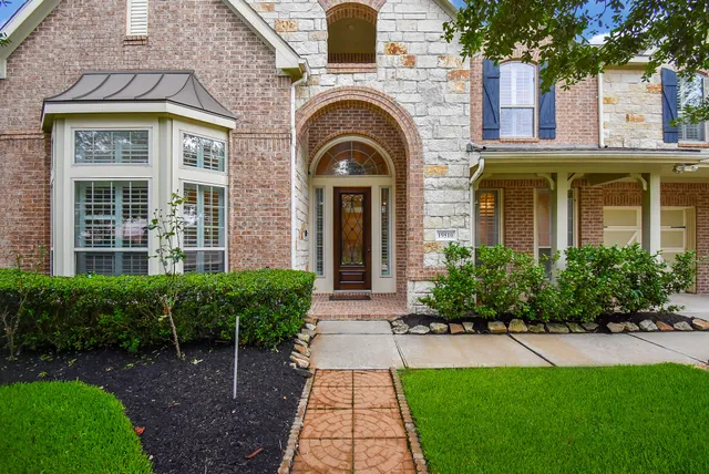 a view of a house with a garden