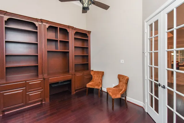 a room with furniture and wooden floor