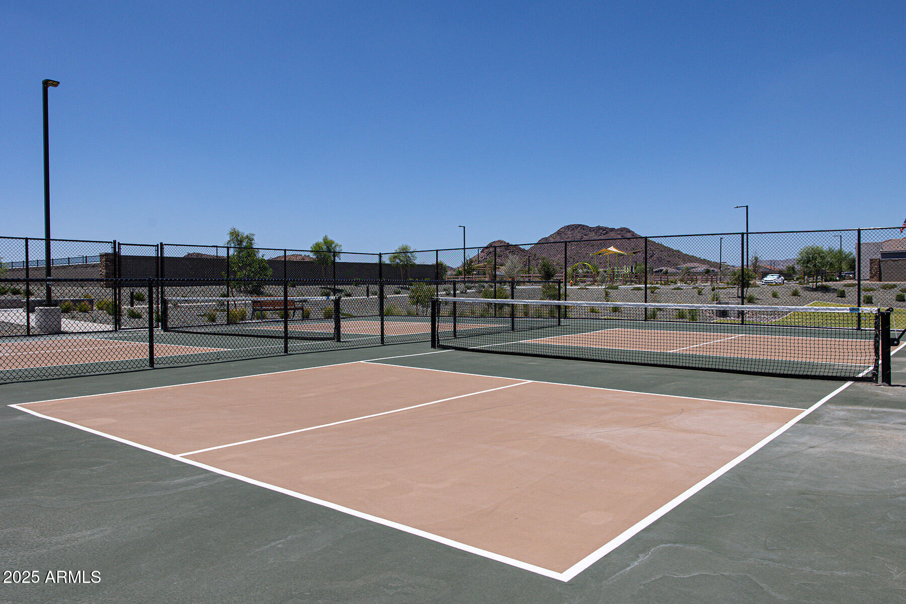 14856 West Briles Road Surprise, AZ 85387 - Photo 12 of 18 a view of a tennis court