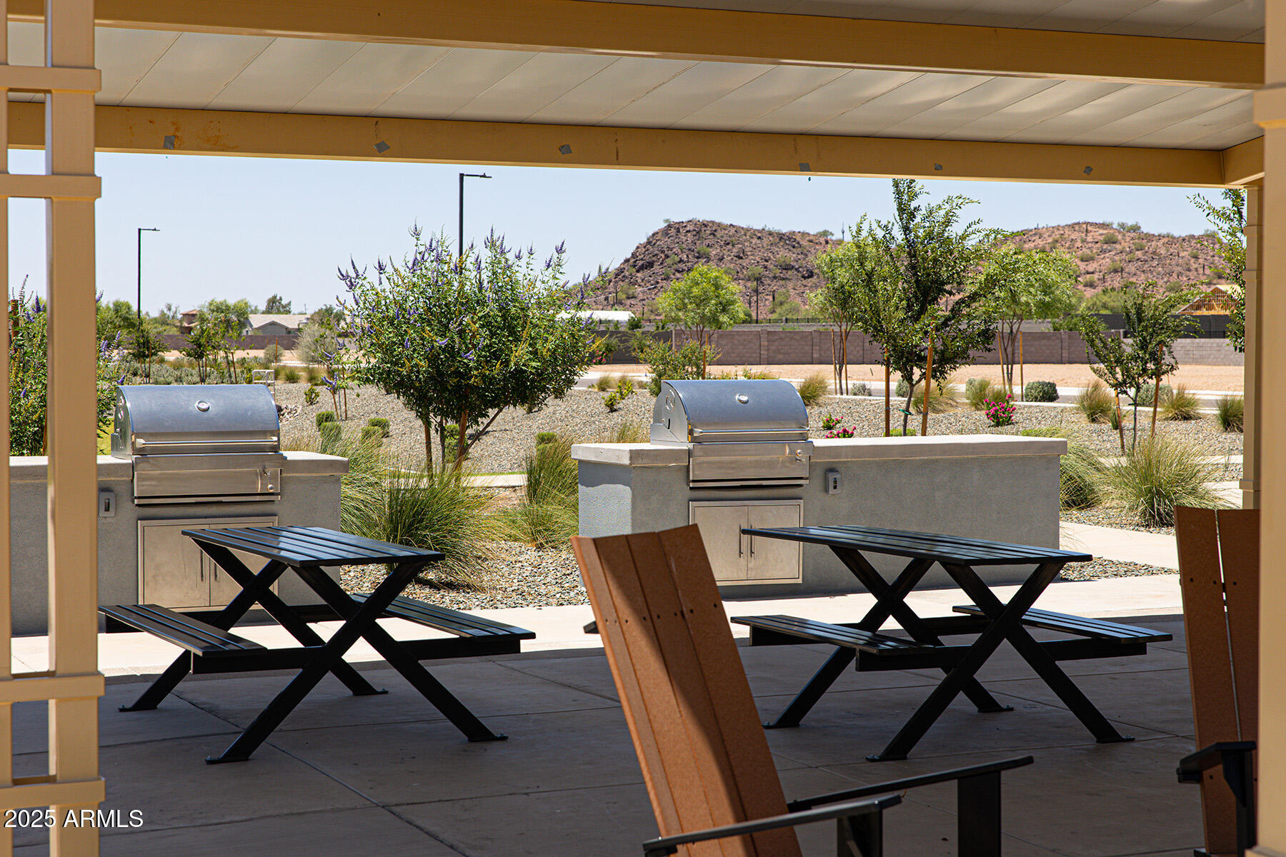 14856 West Briles Road Surprise, AZ 85387 - Photo 4 of 18 a view of a chairs and table in patio