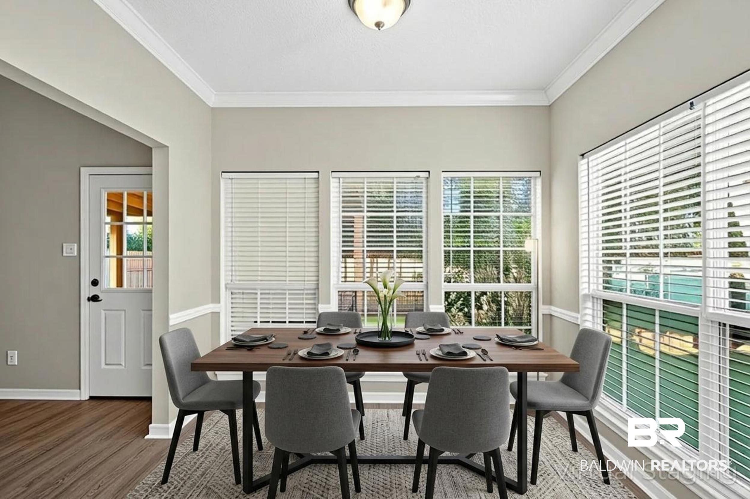 7050 Highpointe Place West Daphne, AL 36527 - Photo 17 of 66 Dining room featuring ornamental molding, wood finished floors, and healthy amount of natural light