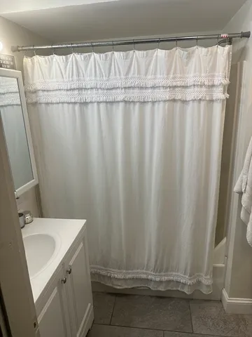 a close up of a toilet with a sink