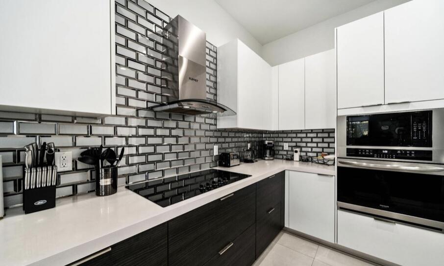 3254 Southwest 44th Street Fort Lauderdale, FL 33312 - Photo 12 of 26 a kitchen with granite countertop a stove and a sink